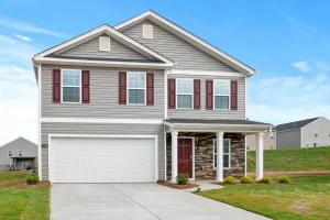 two story home with a white garage door
